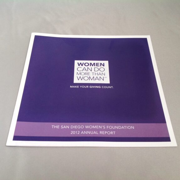 A purple book with the words " women can do it today."